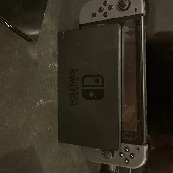 Nintendo Switch Super Smash Bros. Edition: Gray w/ pro controller and steelbook.